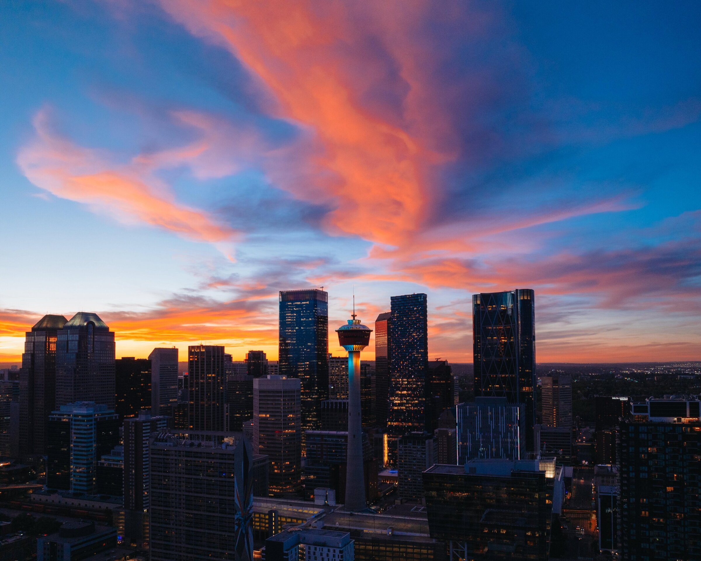 Skyline view of Calgary at sunset, from Scotman's Hill on a summer night.