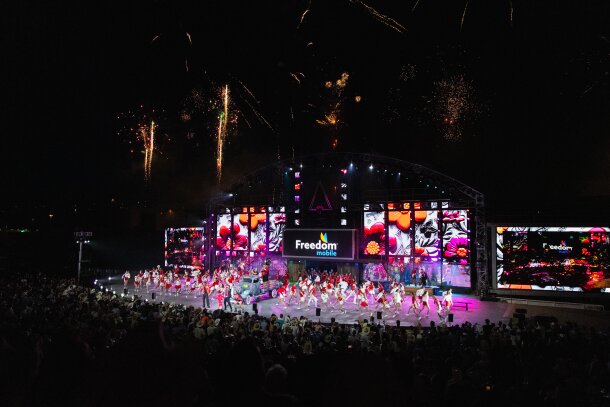 Performers on stage during the Grandstand Show at Stampede.