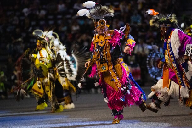 Dancers performing at the Calgary Stampede Powwow.