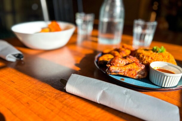 Efo riro with pounded yam and jollof rice with chicken are both favourites at Ahnike’s Restaurant