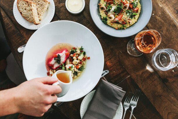 Food being plated by the chef at the Deane House in Calgary