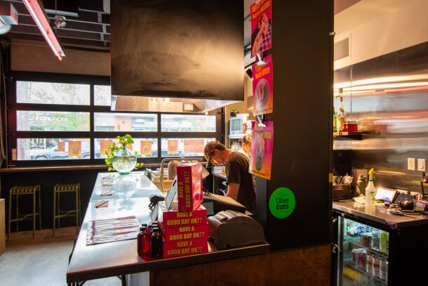 The bar and kitchen at First Avenue Corner Store