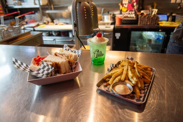 The OG Chicken Katsu Sando with a side of Furikake Fries and Melon Cream Soda at First Avenue Corner Store