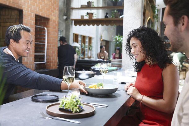 couple being served at the bar at Fortuna's Row