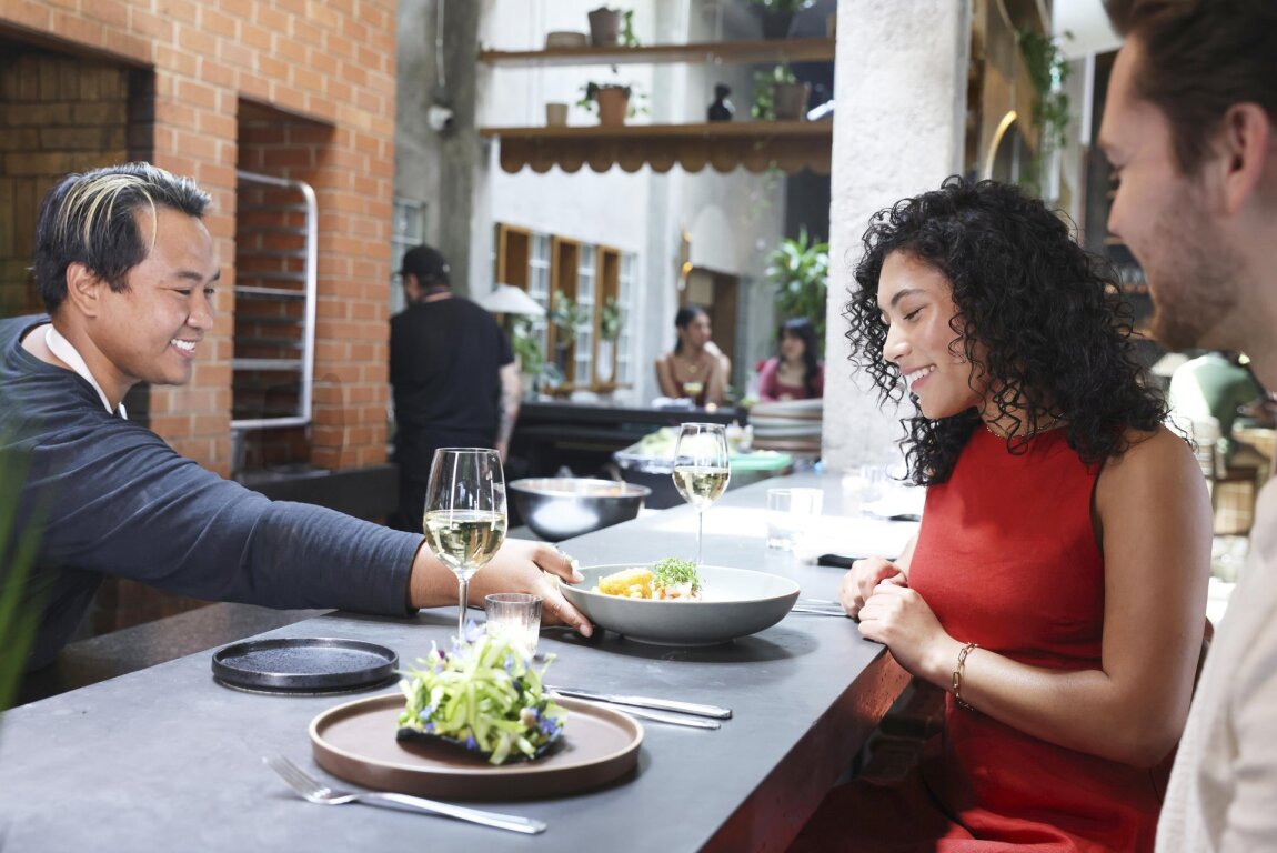 couple being served at the bar at Fortuna's Row