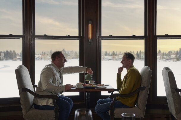 Couple sharing a meal at The Lake House