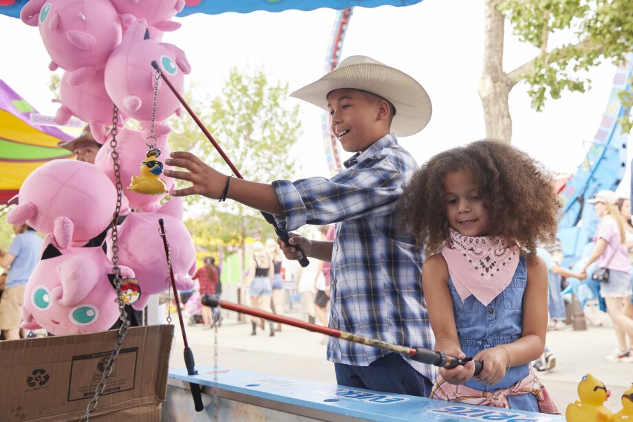 Kids playing at the Midway at Calgary Stampede