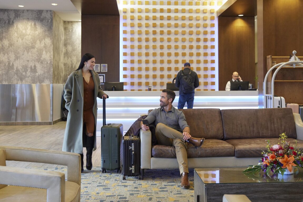 two people in the lobby on Grey Eagle Resort & Casino