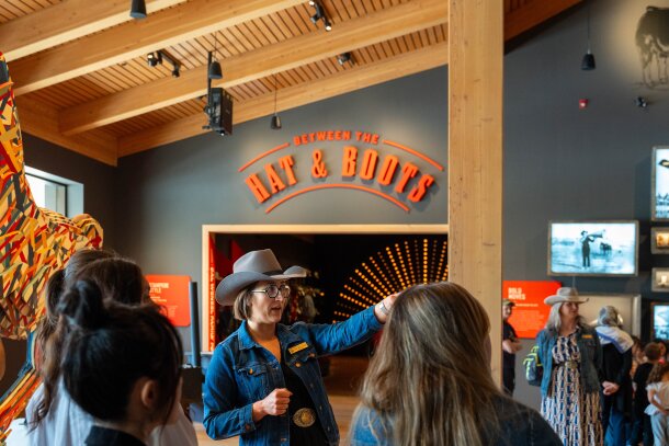 A tour guide shows guests around the Sam Centre.