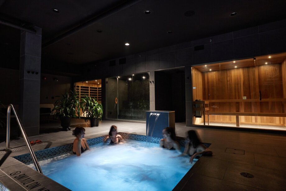 4 female friends enjoying the SKA Thermal Spa hot tub