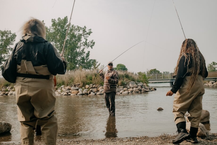 Three people fishing at St. Patrick's Island