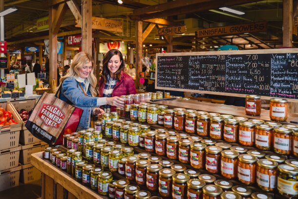Two woman shopping at the Calgary Farmers' Market