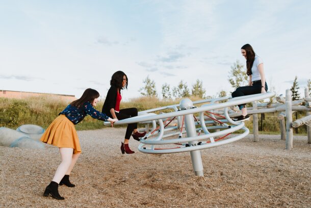 Women playing on the TELUS Spark game structures